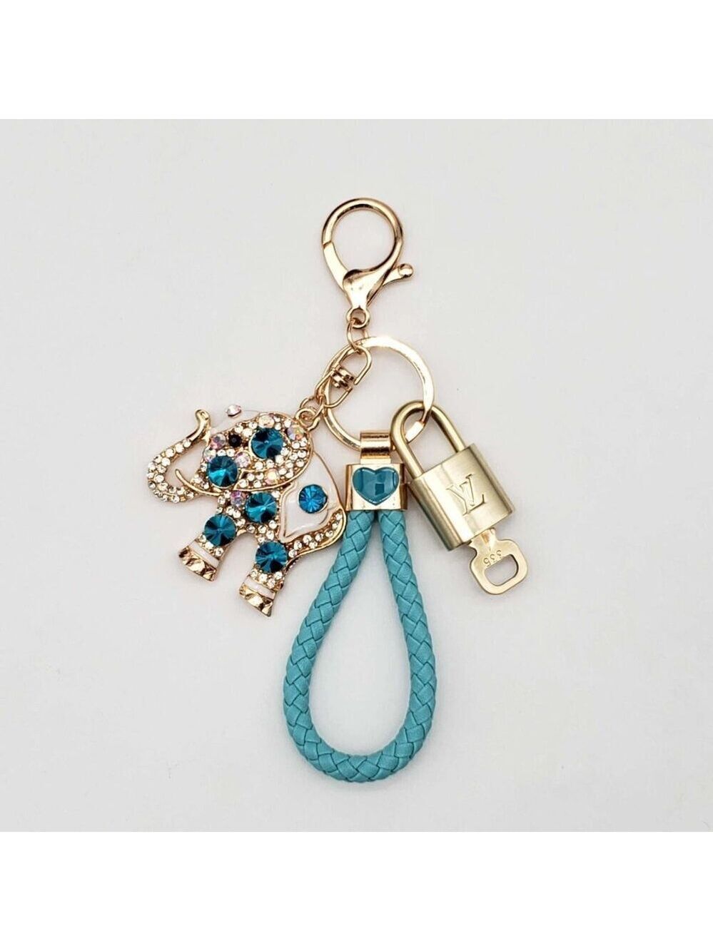 Authentic Louis Vuitton Lock & Key with unbranded Elephant Bagcharm, Keycharm